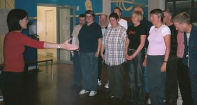 Chorus rehearsing before Performance at Manchester Museum